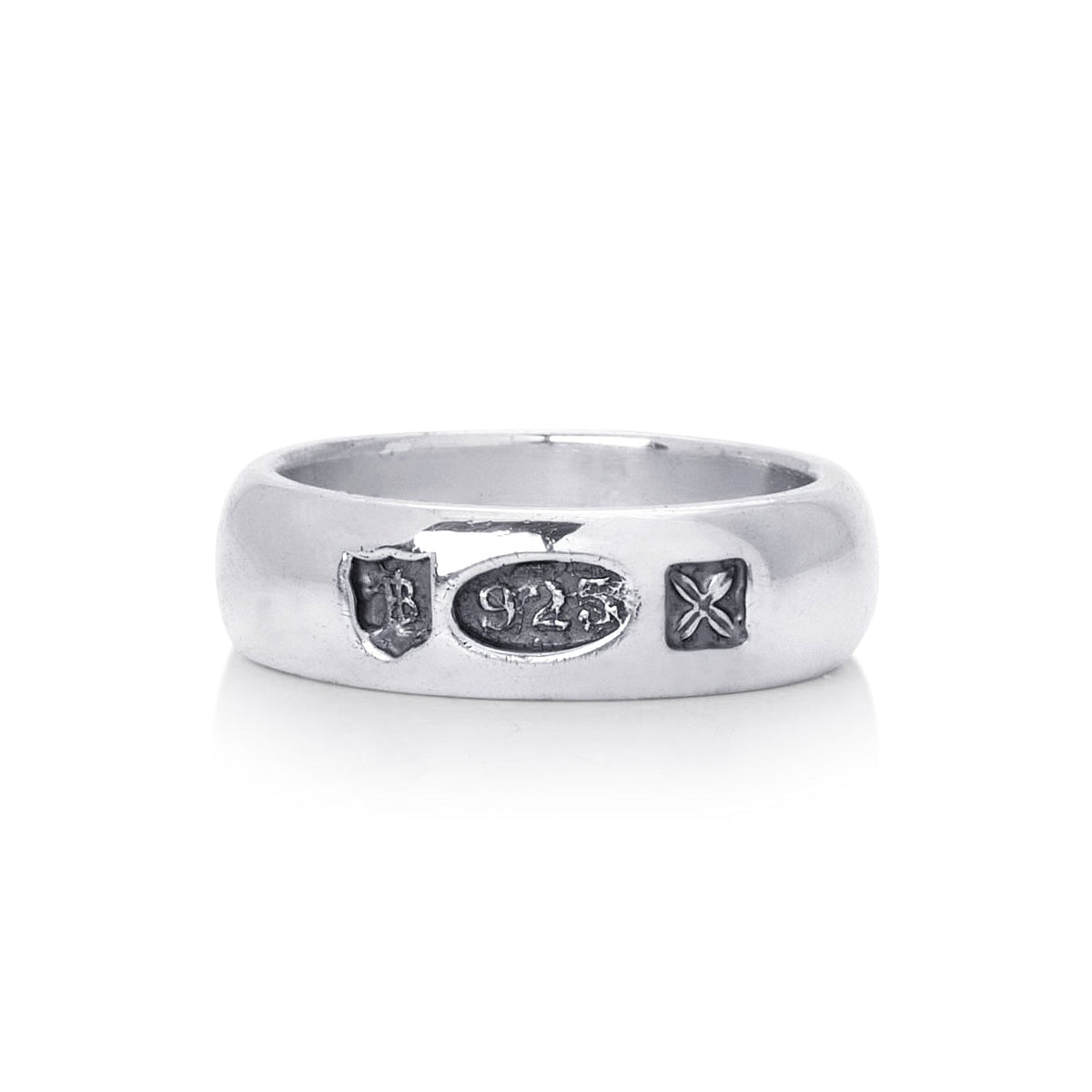 Mens sterling silver hallmark band, hallmarks stamped on ring. shown on a pain white background.