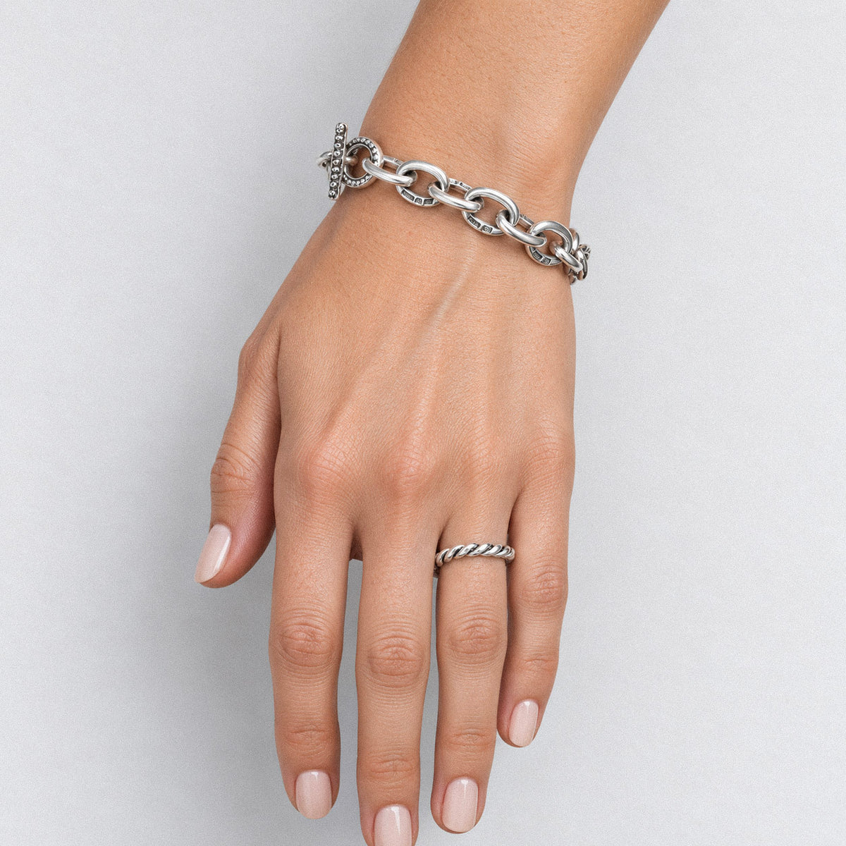 women's hallmark link sterling silver bracelet worn on wrist