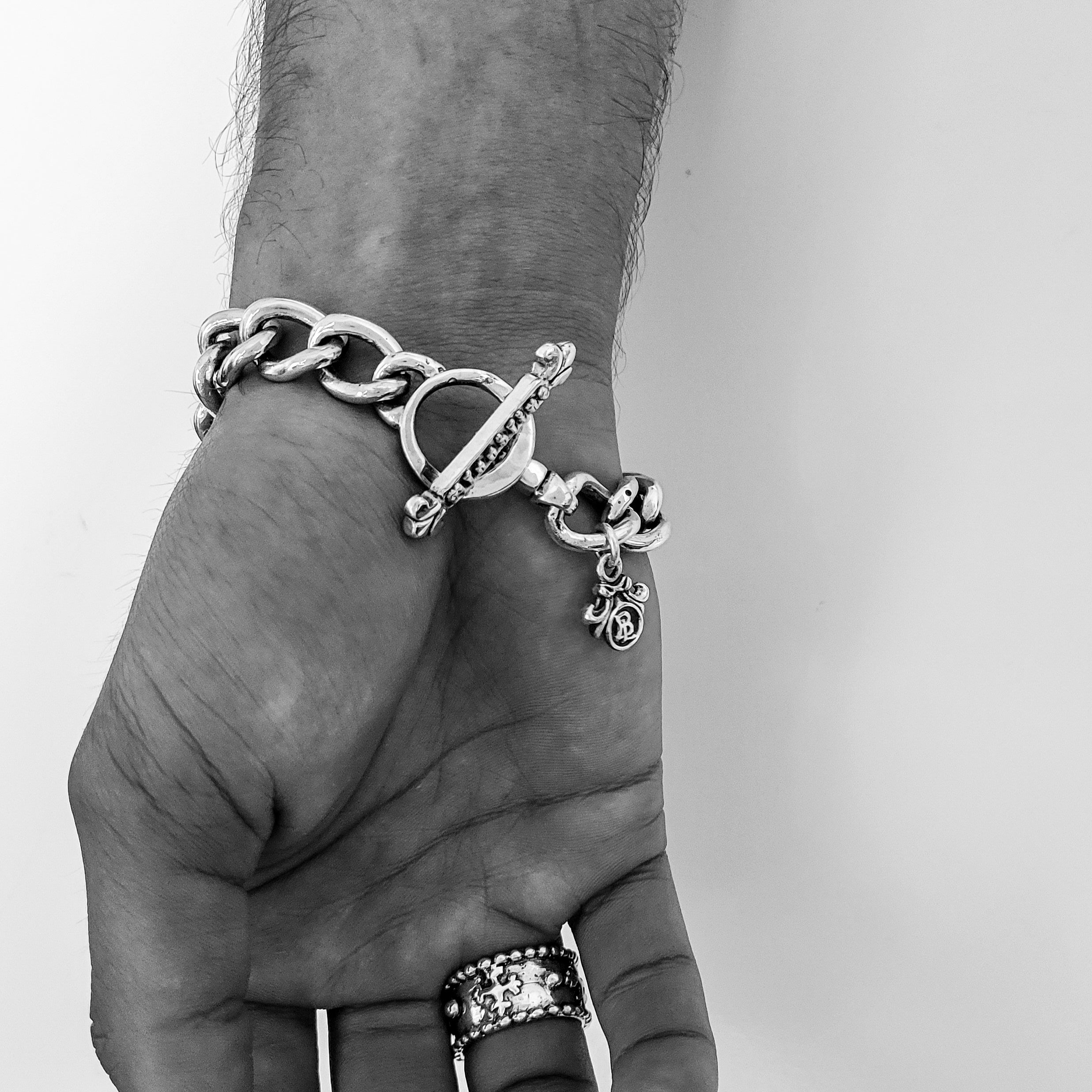 Bloodline Design Mens Bracelets The O.G. and Box Cross Link Bracelet shown on a model.