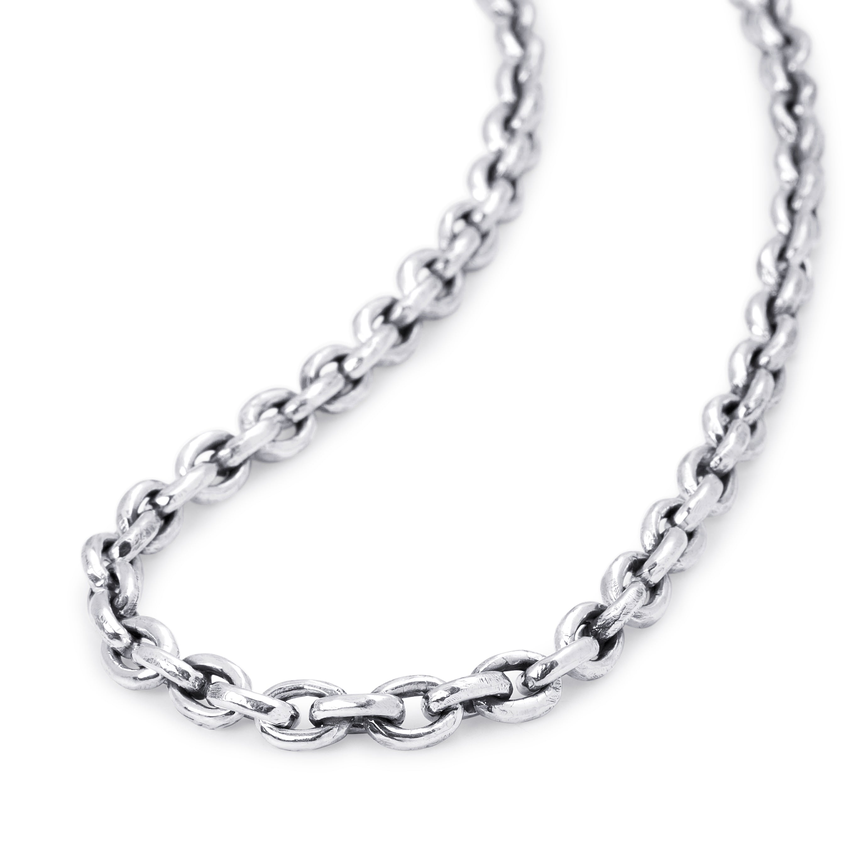 A close-up of a polished silver-tone metal chain necklace on a plain white background.