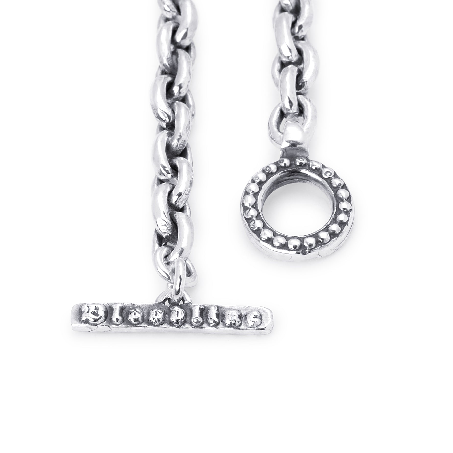 Silver-tone toggle clasp charm with a bar and ring closure, shown on a plain white background.
