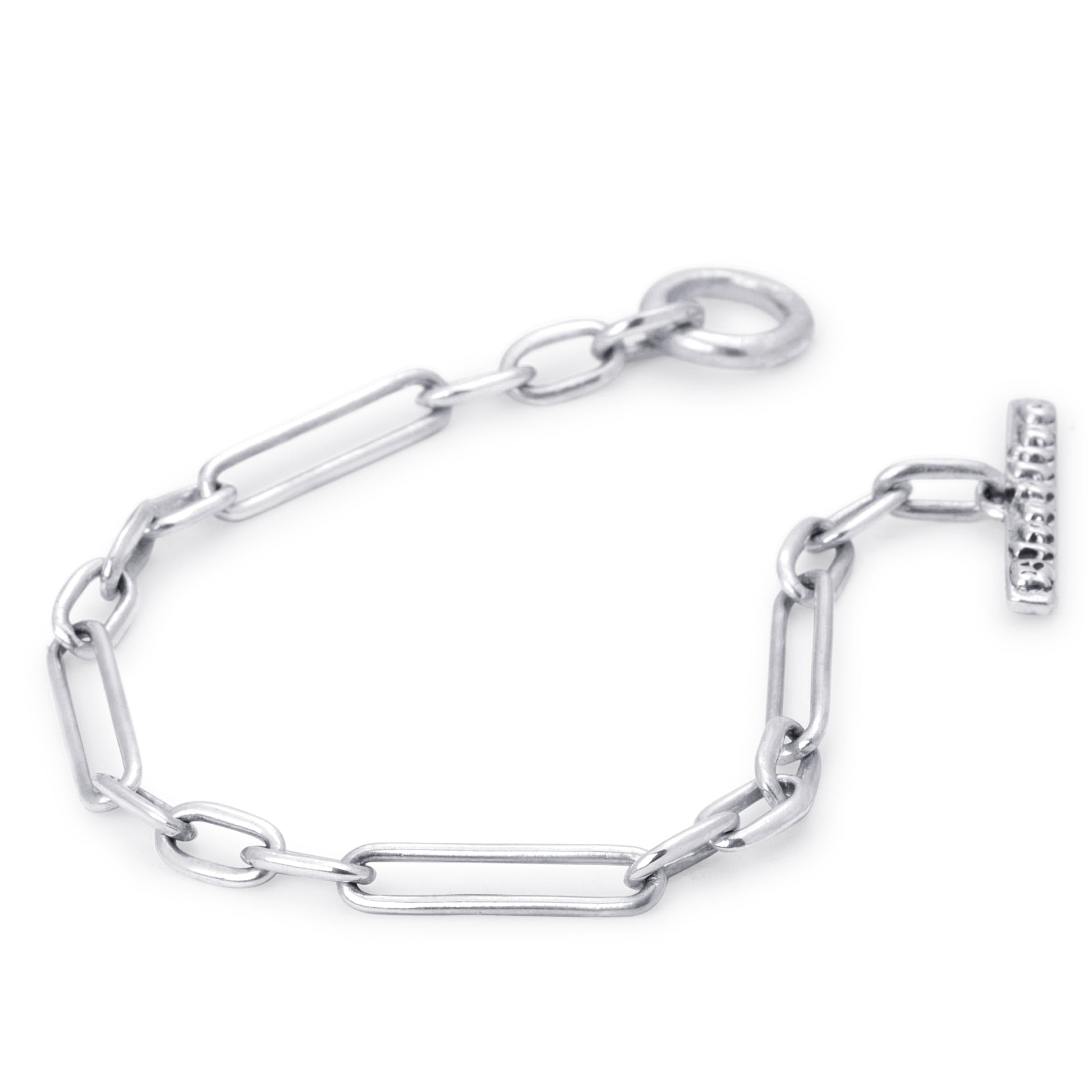 A silver paperclip/Trombone chain bracelet with a toggle clasp featuring the brand name n raised letters, displayed on a clean white background.