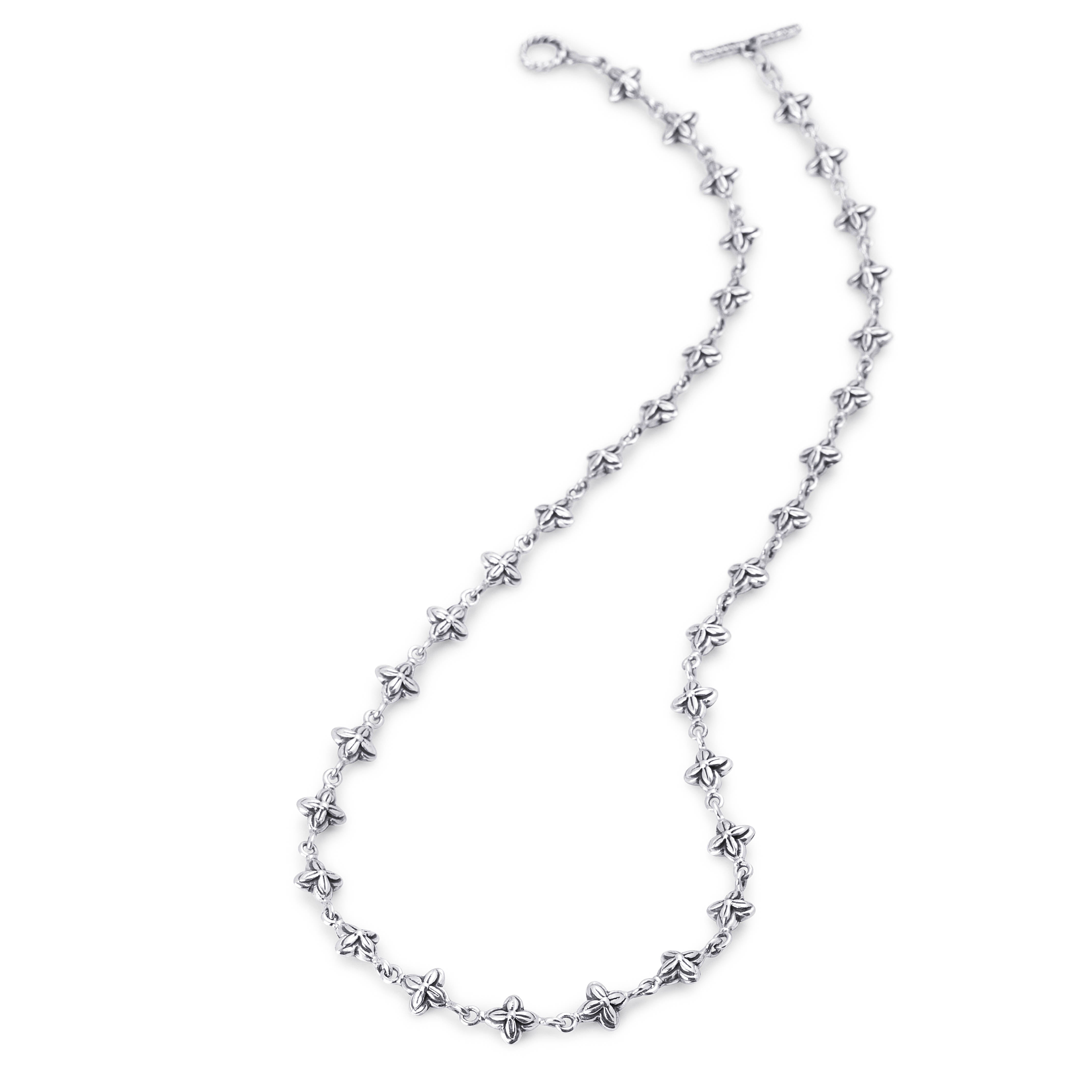 A silver-toned star-link chain necklace with a toggle clasp, displayed on a clean white background.