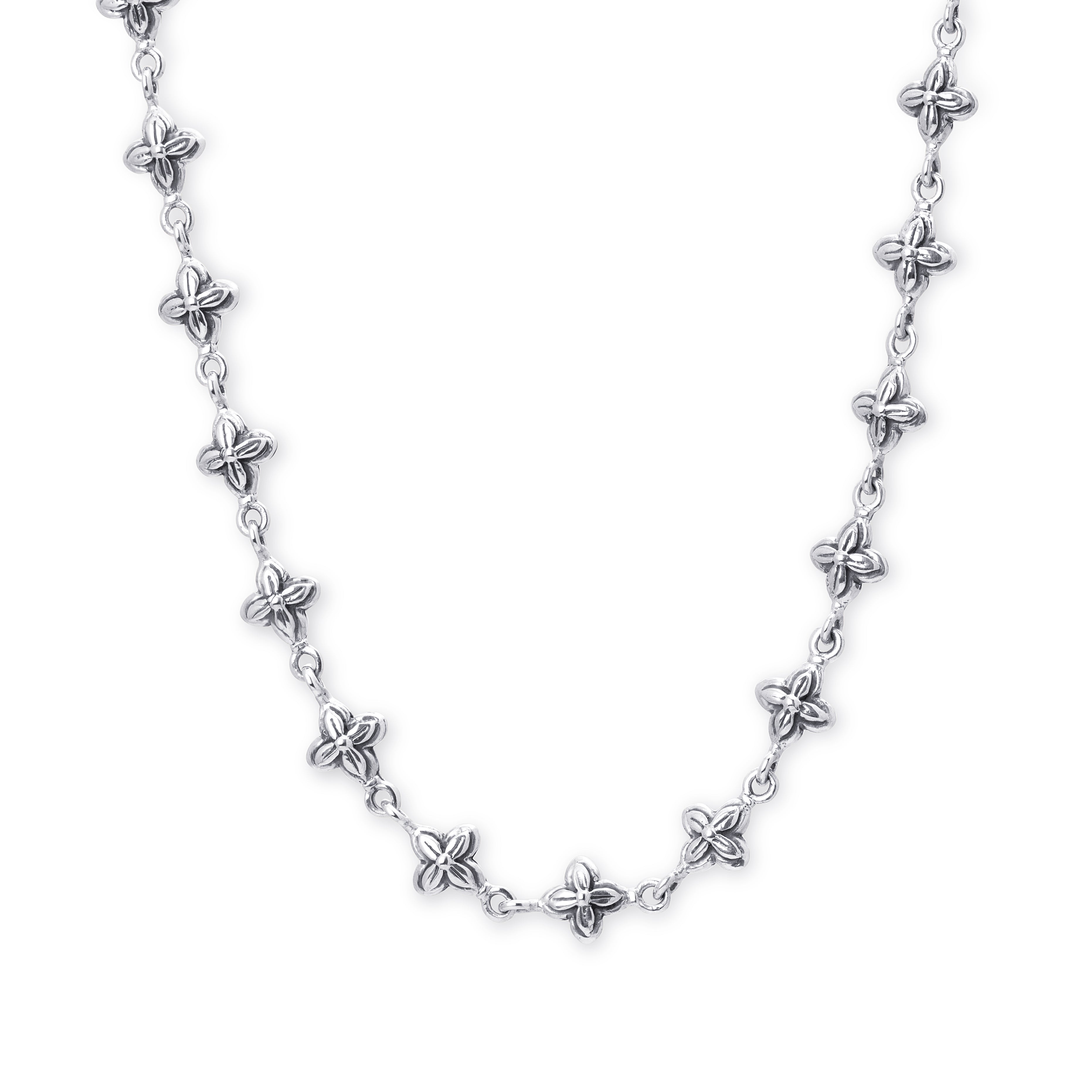 Necklace with floral shapes on a white background