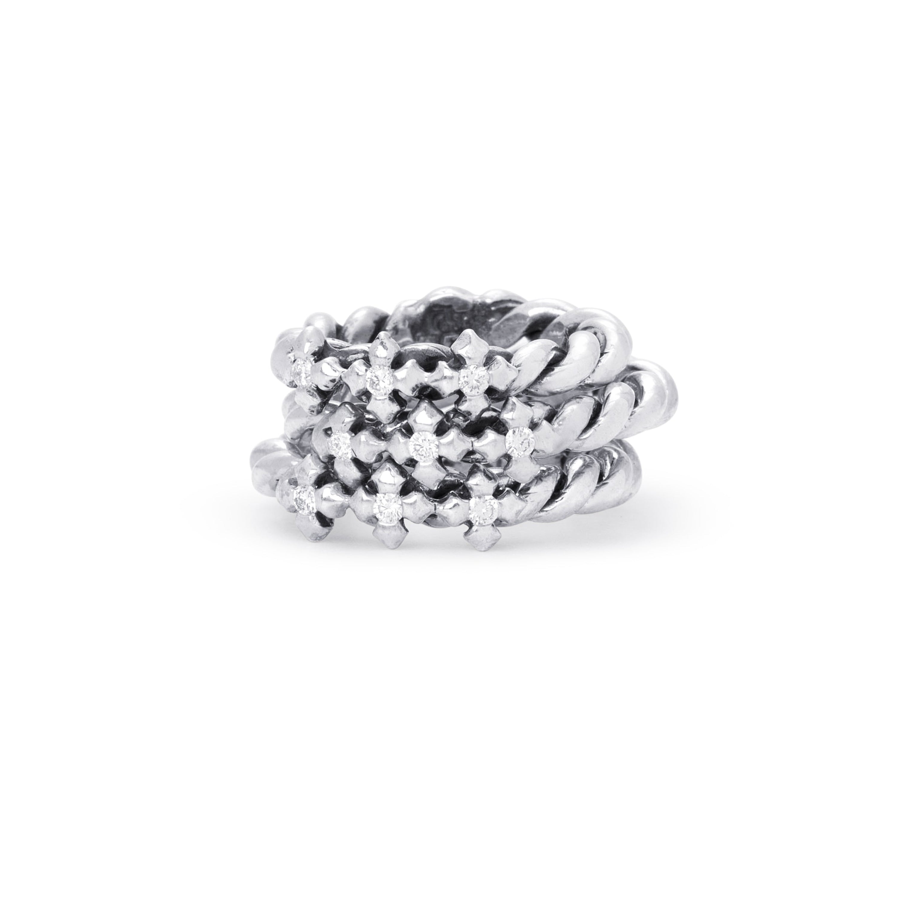 3 Silver rings stacked with clear lab diamonds on a white background