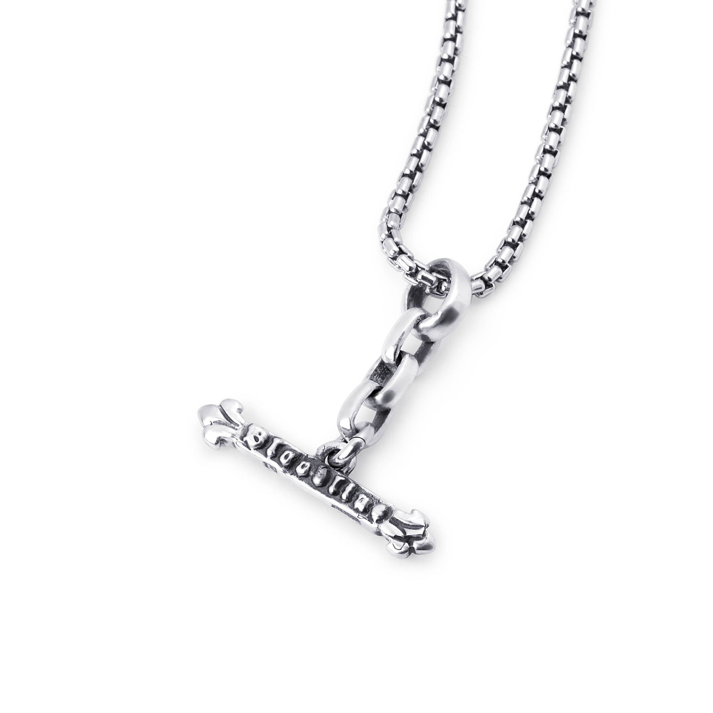 A silver-toned necklace featuring a small cross pendant with the word 'BLOODLINE' engraved on it, suspended from a box chain against a plain white background.