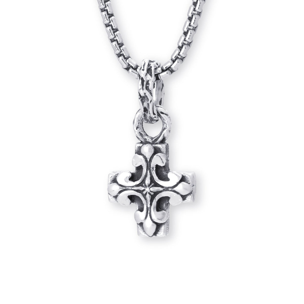 A silver cross pendant necklace with an ornate, textured filigree design, suspended from a matching silver box chain against a plain white background.