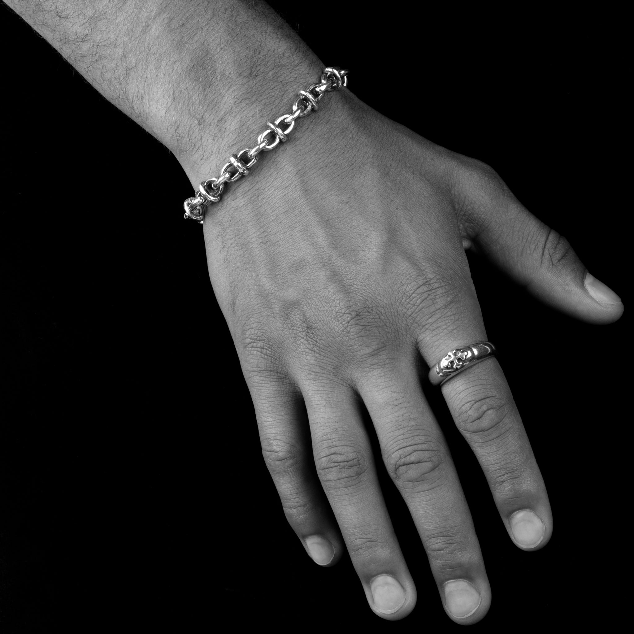 Men's solid sterling chiseled anchor link bracelet worn on wrist - Bloodline Design