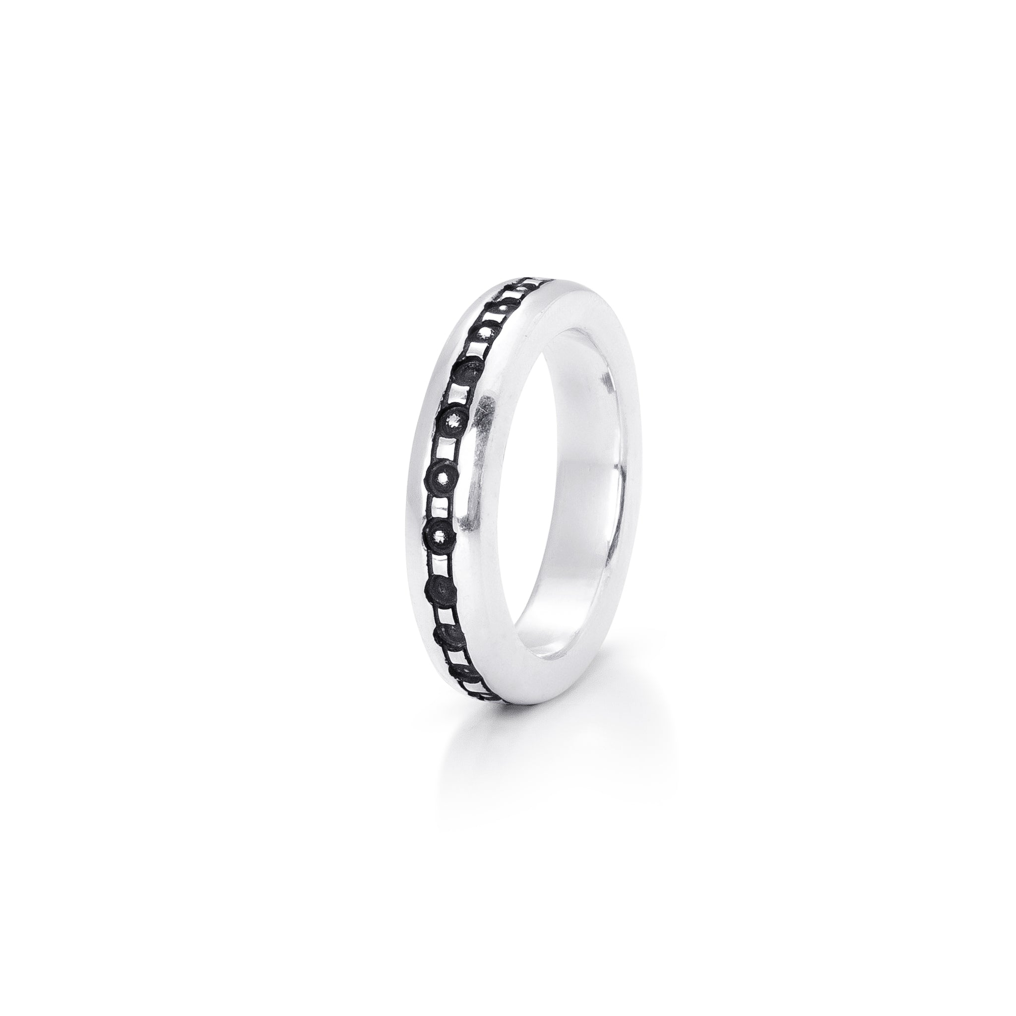 solid sterling silver band with a small dot motif going around the centre of it.