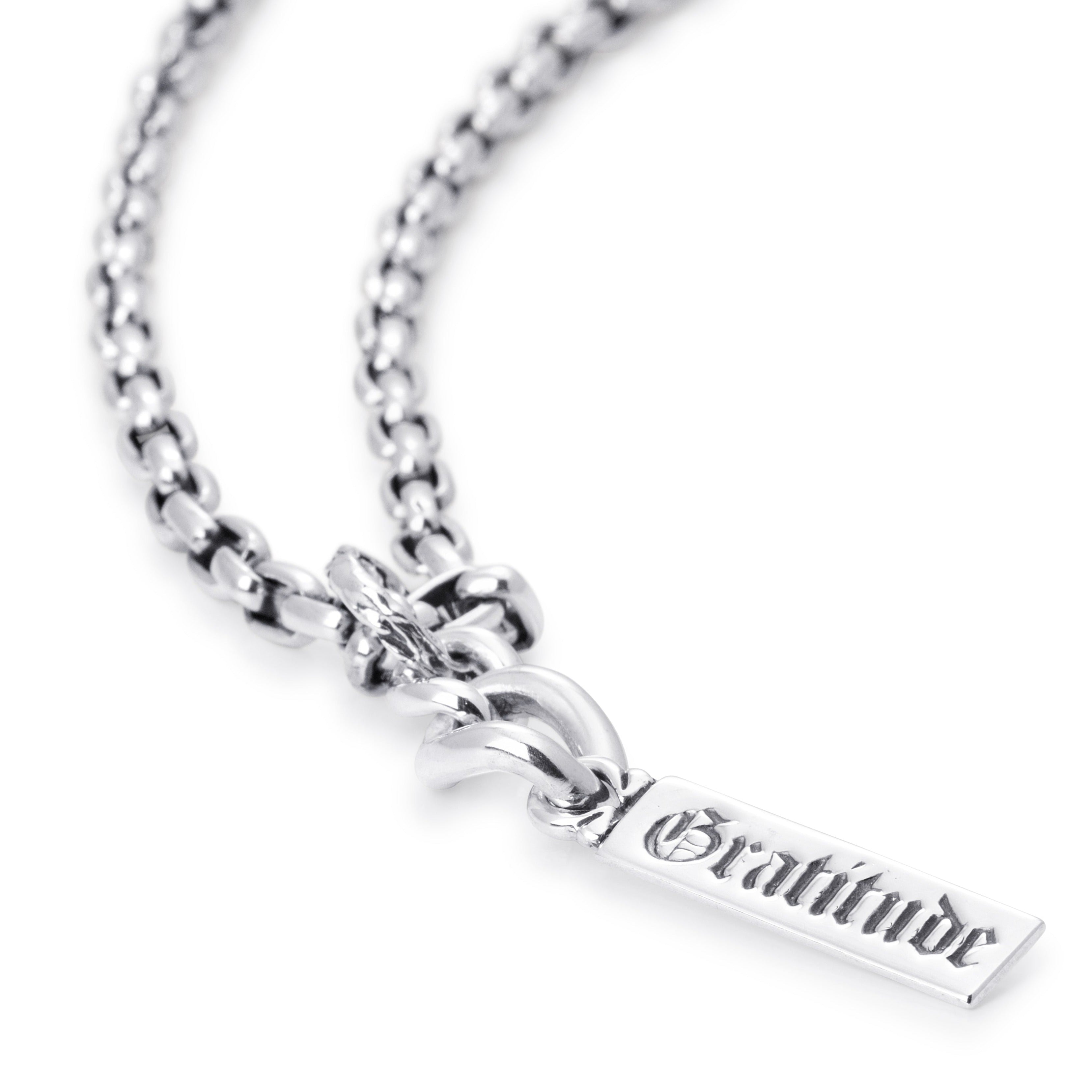 Gratitude Word Pendant in Sterling Silver engraved in an Old World font.