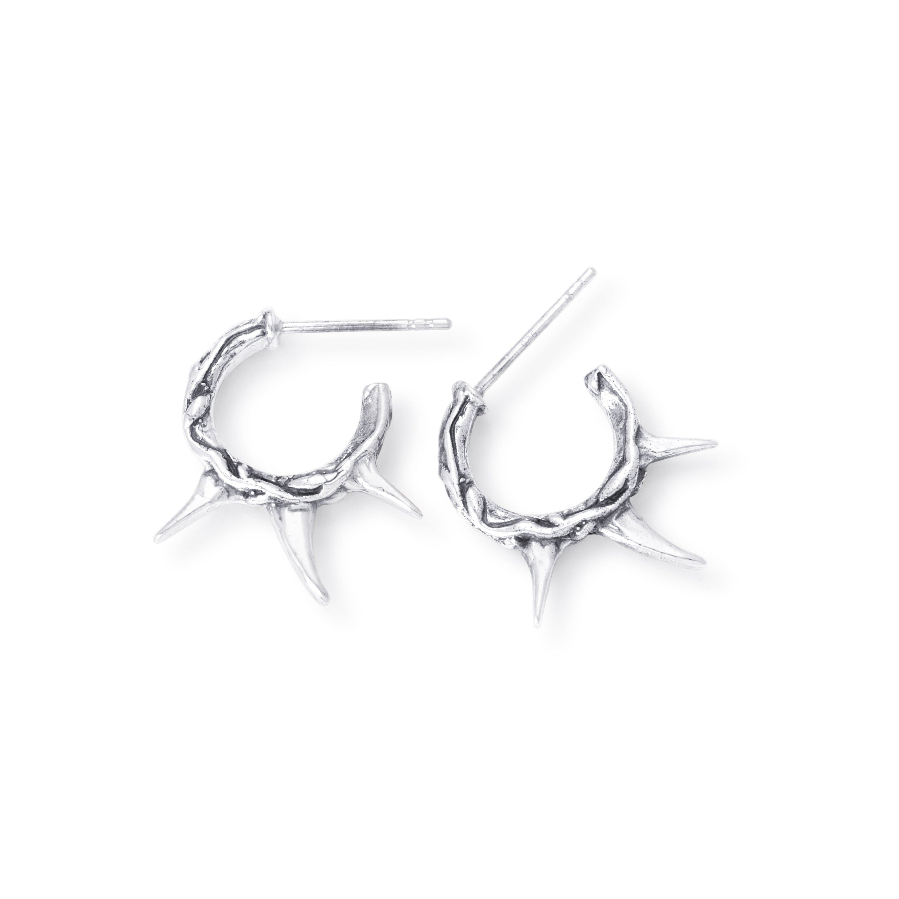 Over head shot of our sterling silver small eternal vine thorn hoops