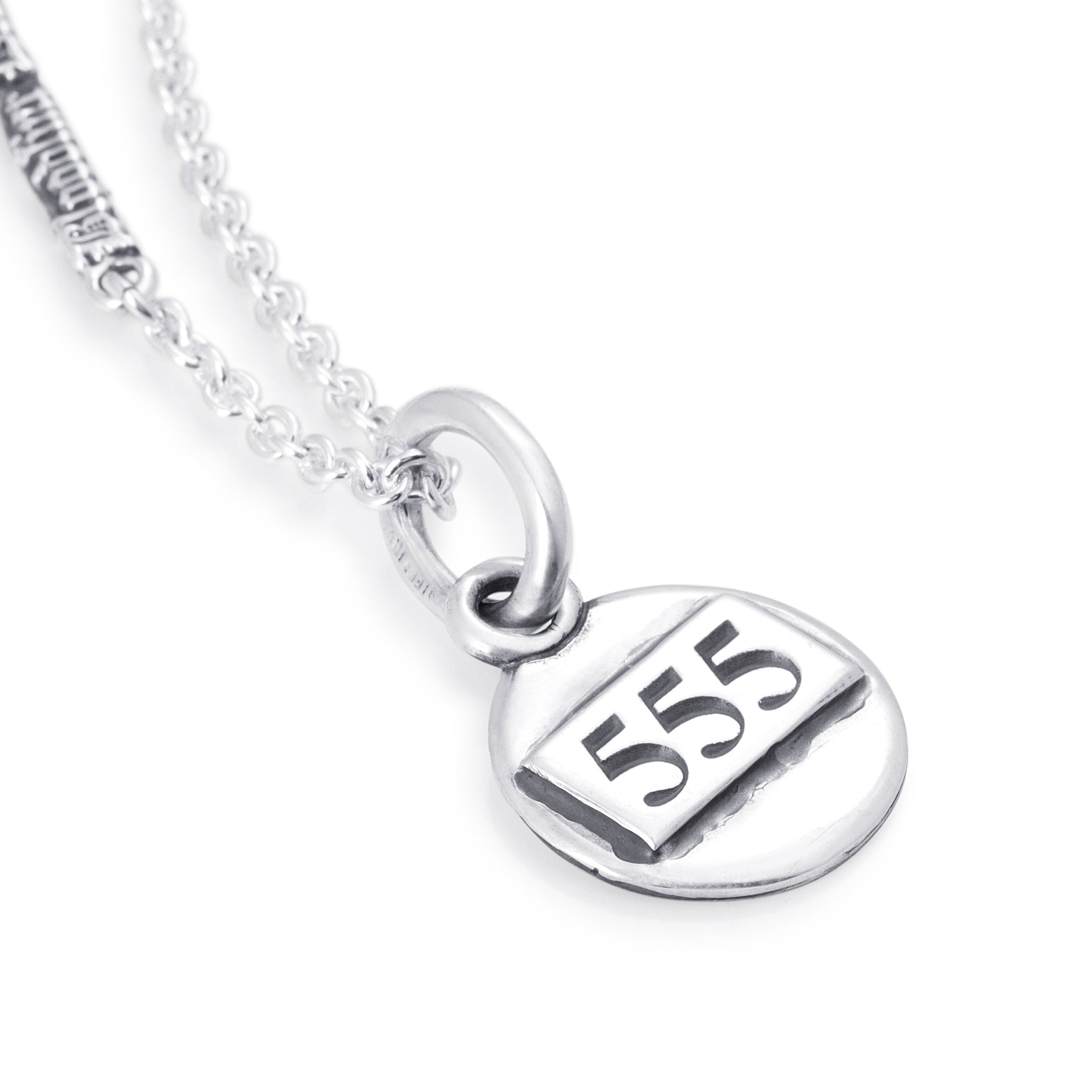 Solid Sterling Silver, centred with Angel Numbers on a plain coin shaped pendant