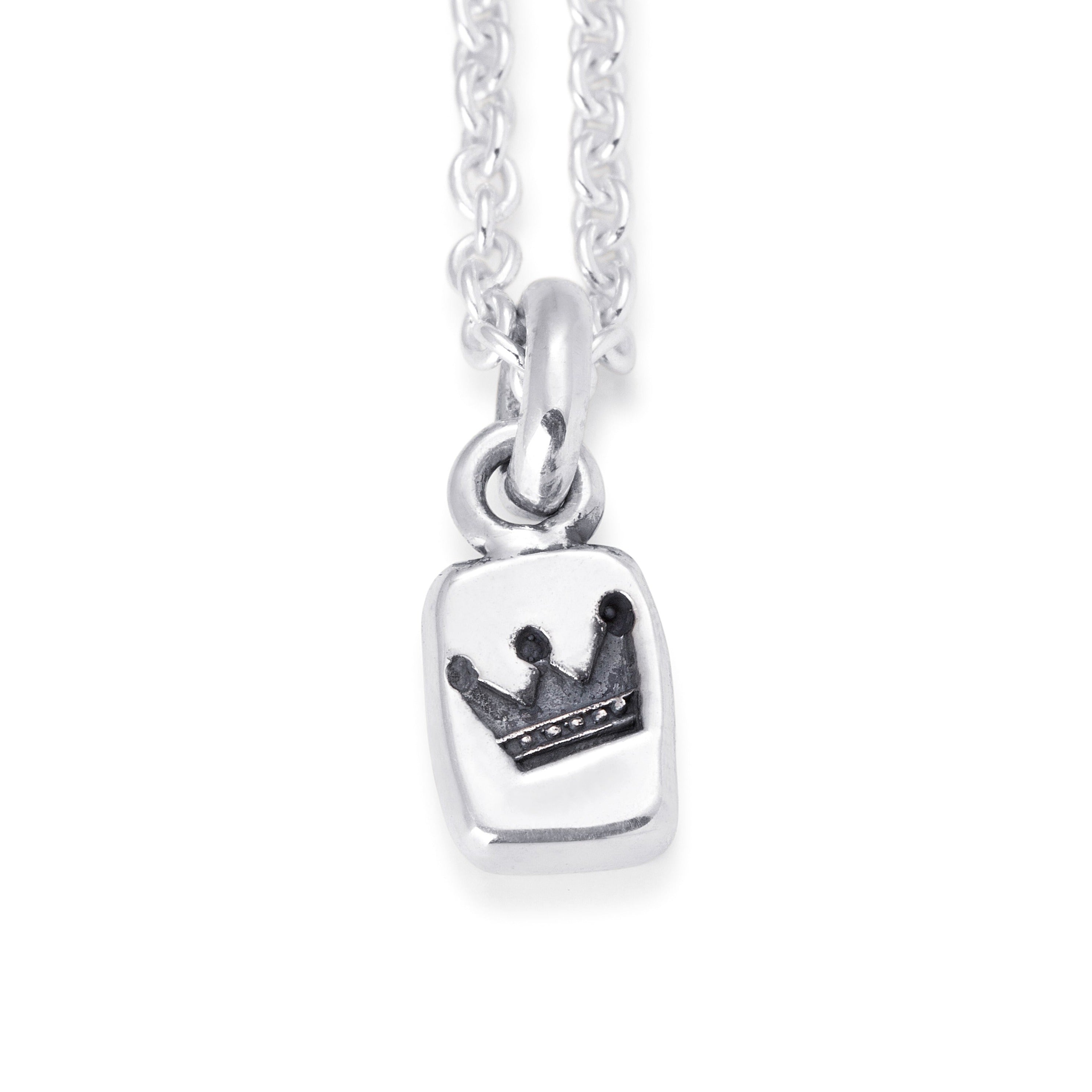 Solid Sterling Silver tablet style pendant stamped with a crown design.