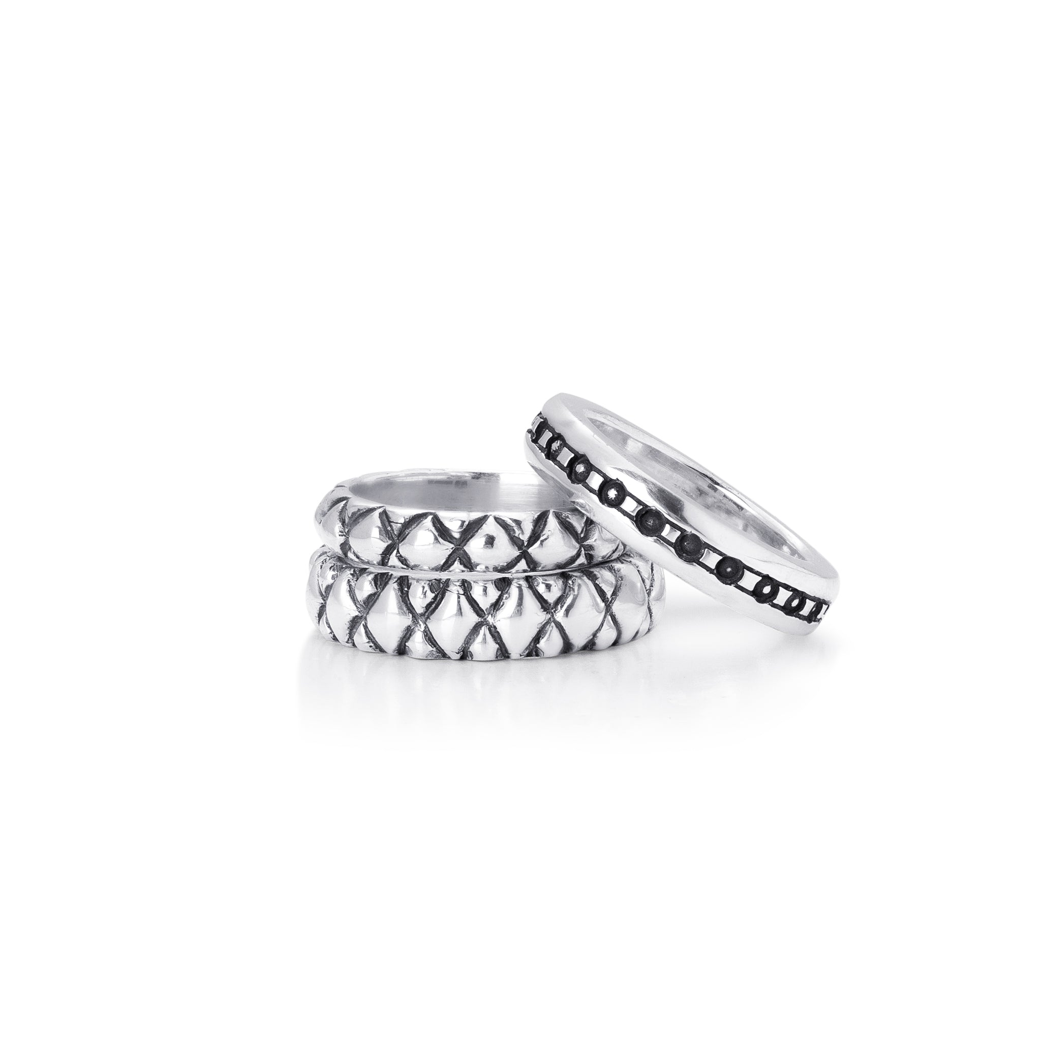 Three rings stacked together- Dotted Band and the small and medium Quilted Bands