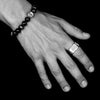 Bloodline Design Mens Rings Large busted bolt ring on a male model hand