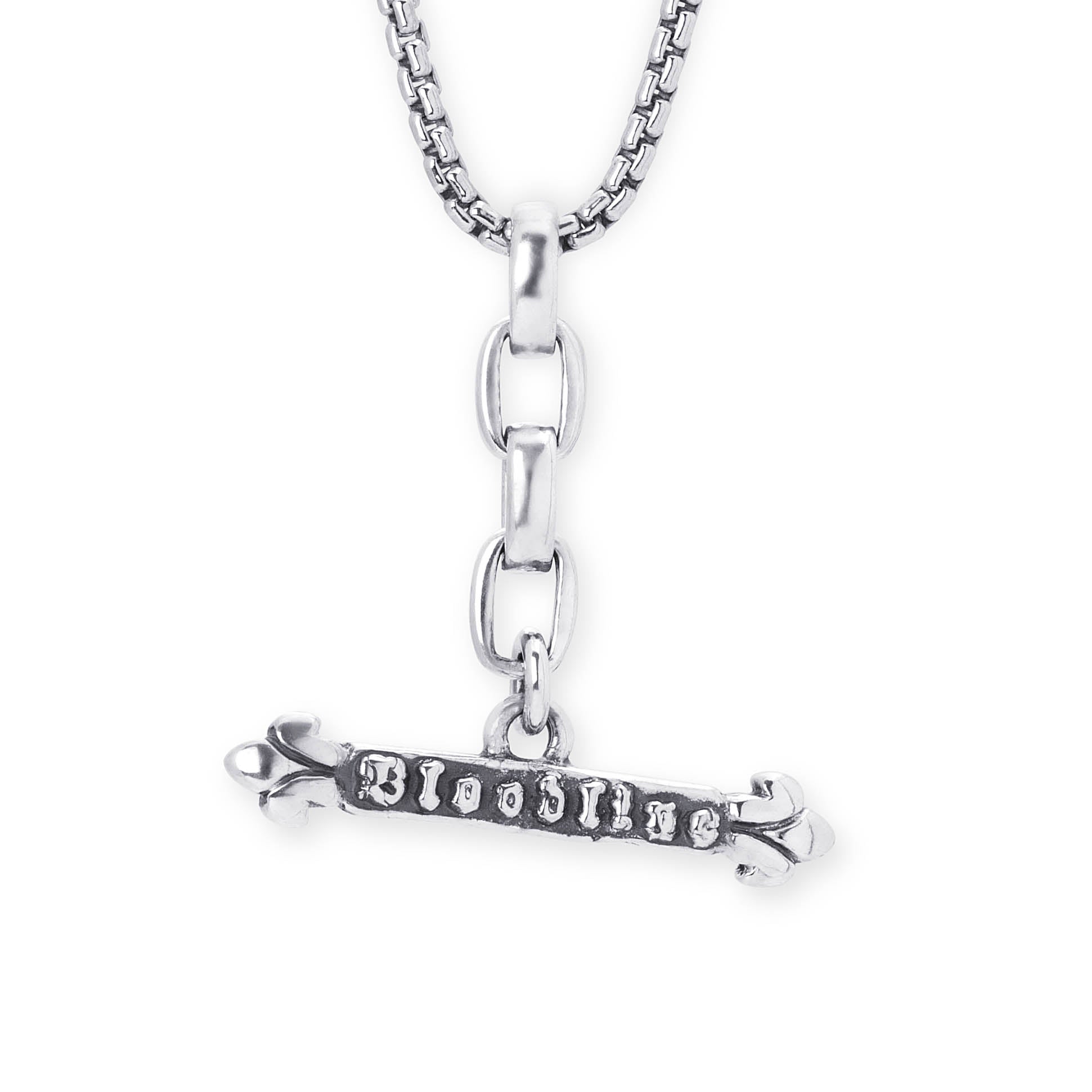 A silver-toned metal pendant necklace featuring a horizontal bar engraved with the word 'BLOODLINE' in a distressed, darkened font, suspended from a box chain on a plain white background.