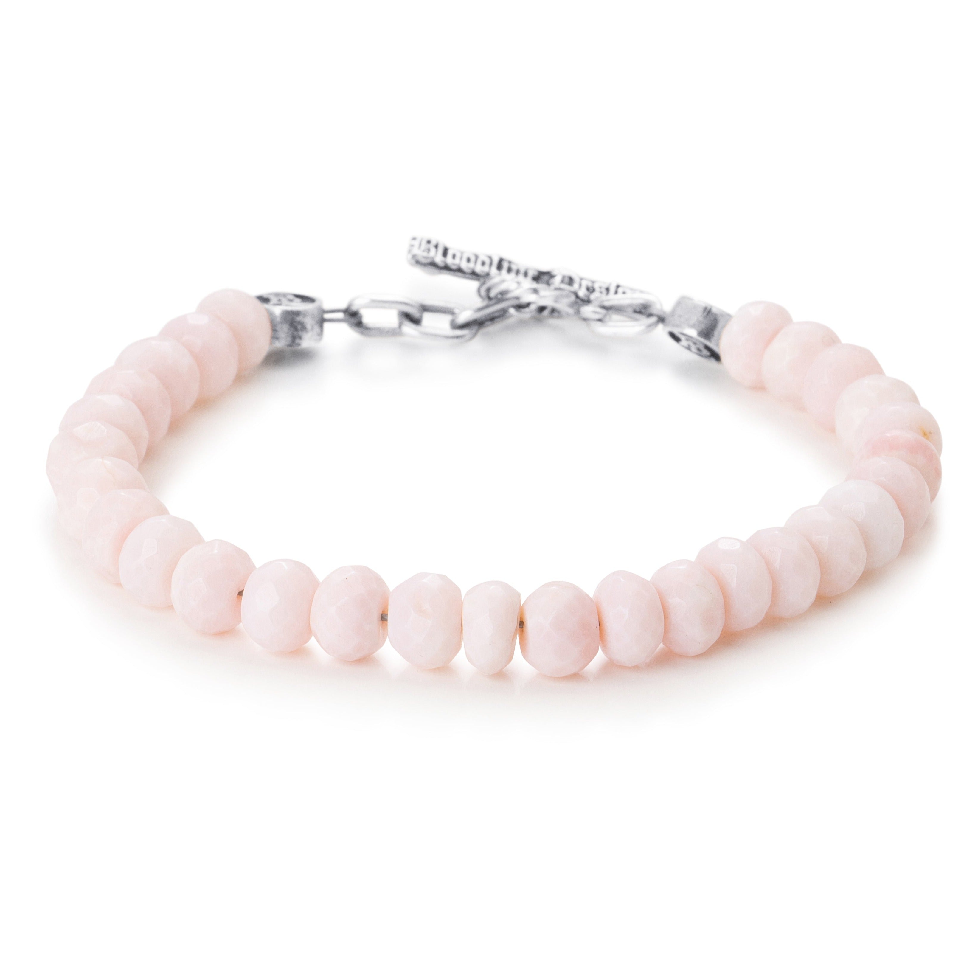 Faceted Pink Peruvian Opal beads on a stainless steel cable with Sterling silver T clasp.