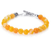 Faceted Mango Quartz beads on a stainless steel cable with Sterling silver T clasp.
