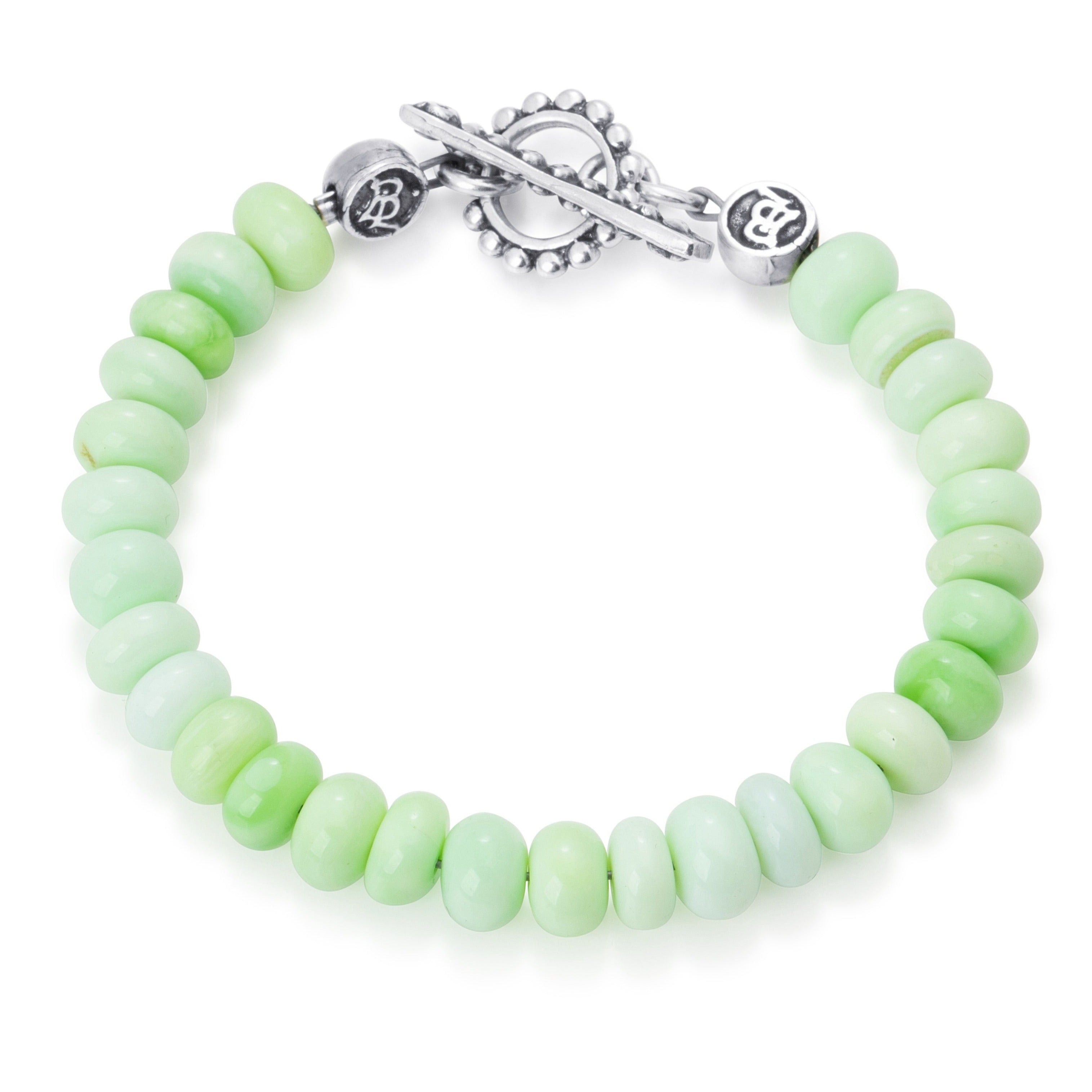 Oval Green Peruvian Opal beads on a stainless steel cable with Sterling silver T clasp.