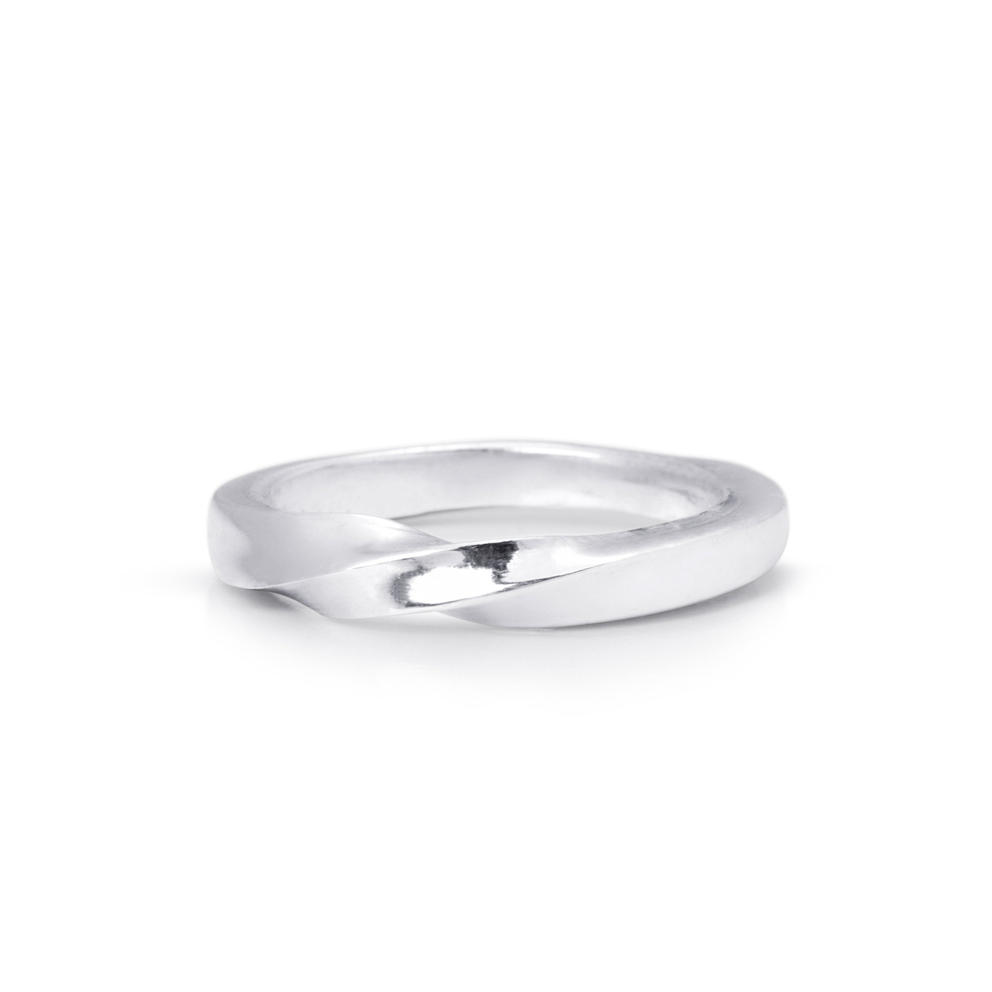 small sterling size band with a twist in the centre giving it a unique quality