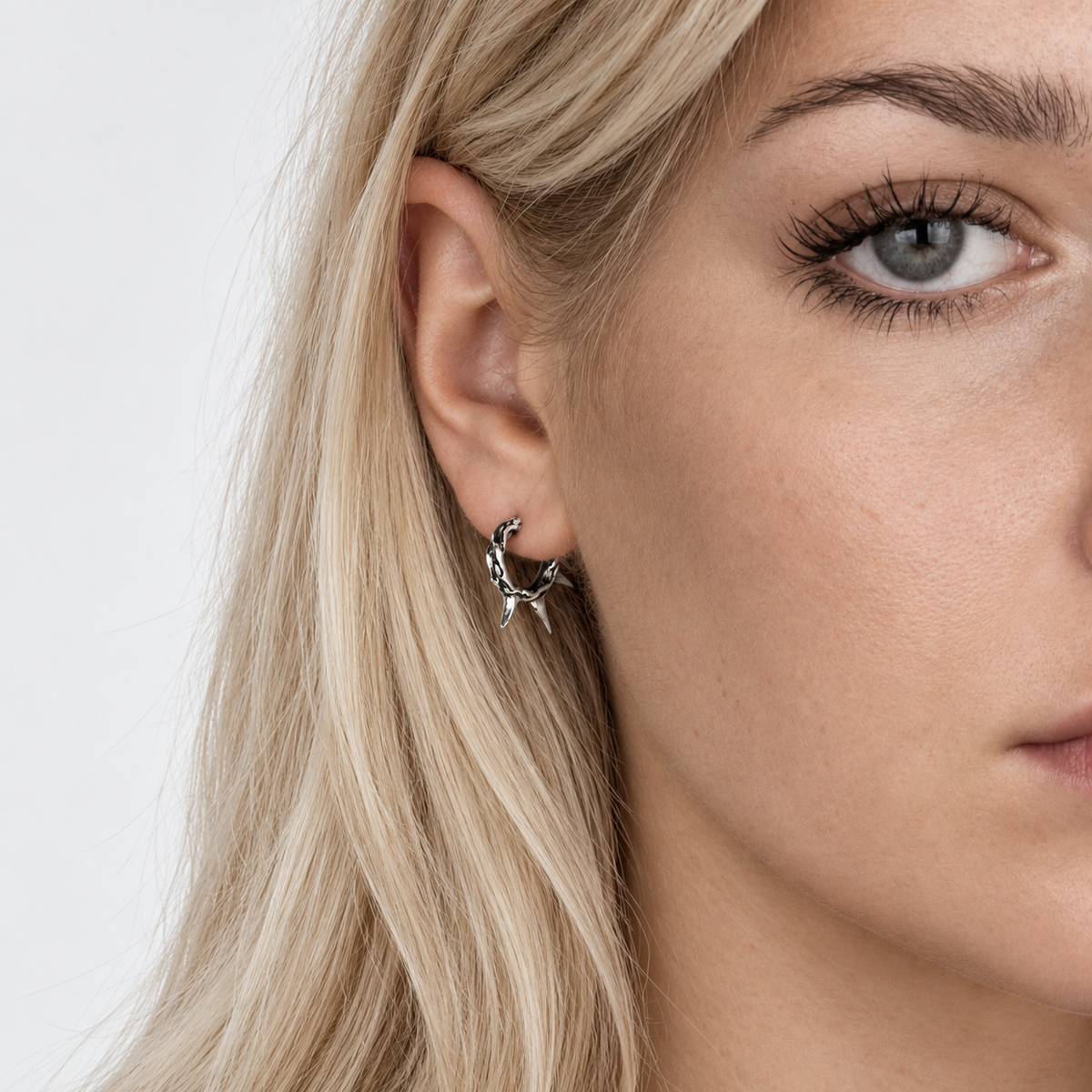 Small Eternal Vine Thorn Hoop sterling silver earrings worn on ear - Bloodline Design