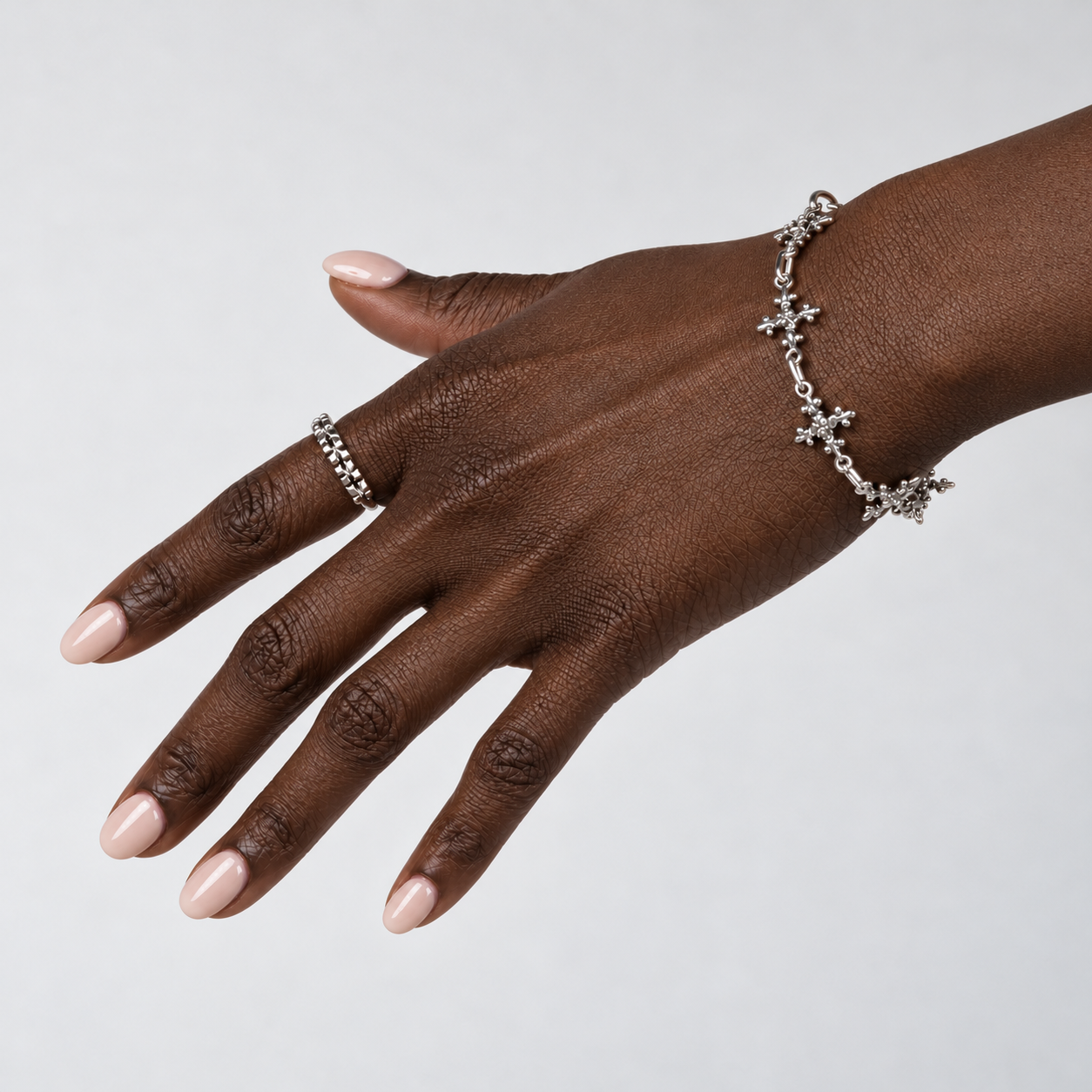 women's sterling silver antique french cross link bracelet worn on wrist
