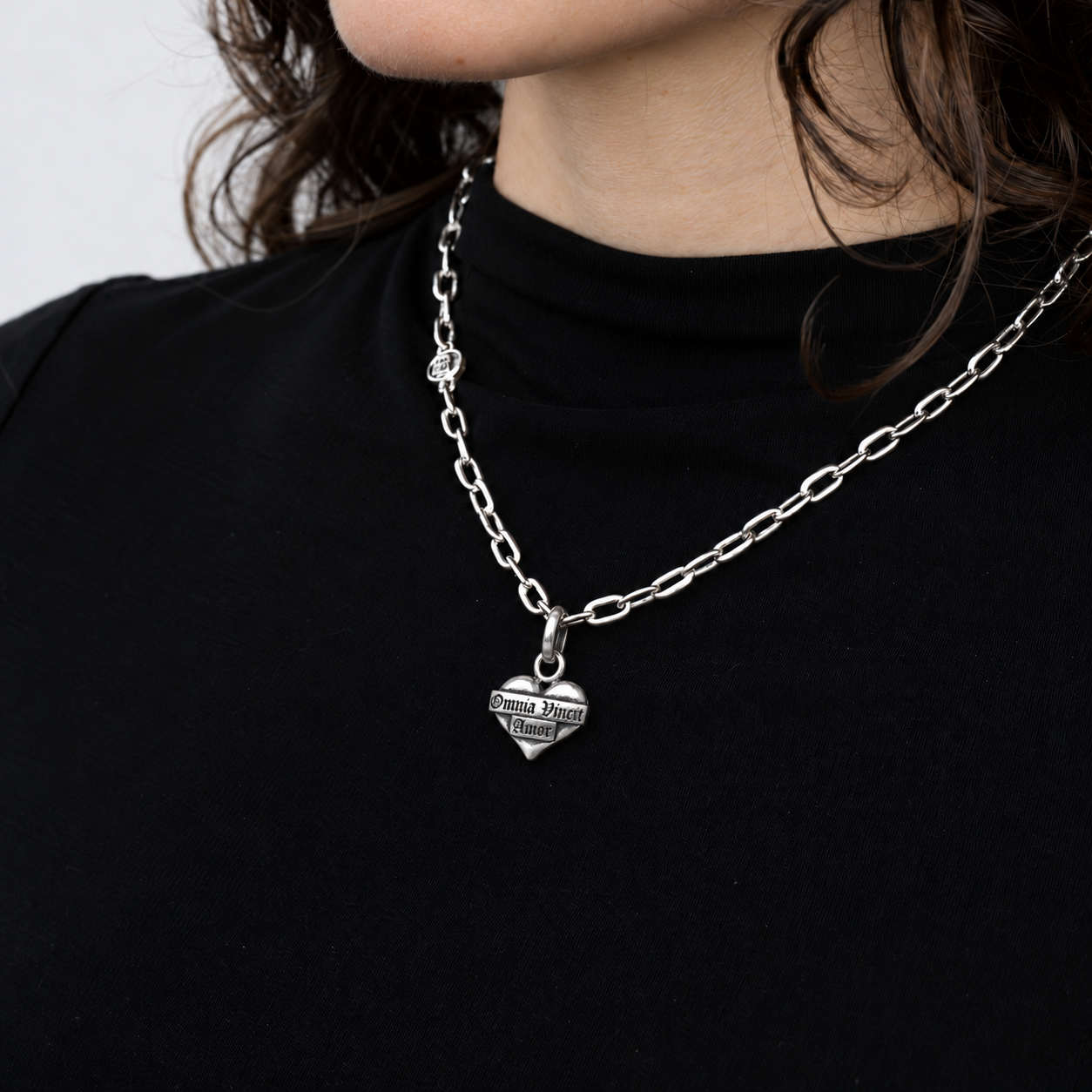small omnia vincit amor Sterling Silver Pendant