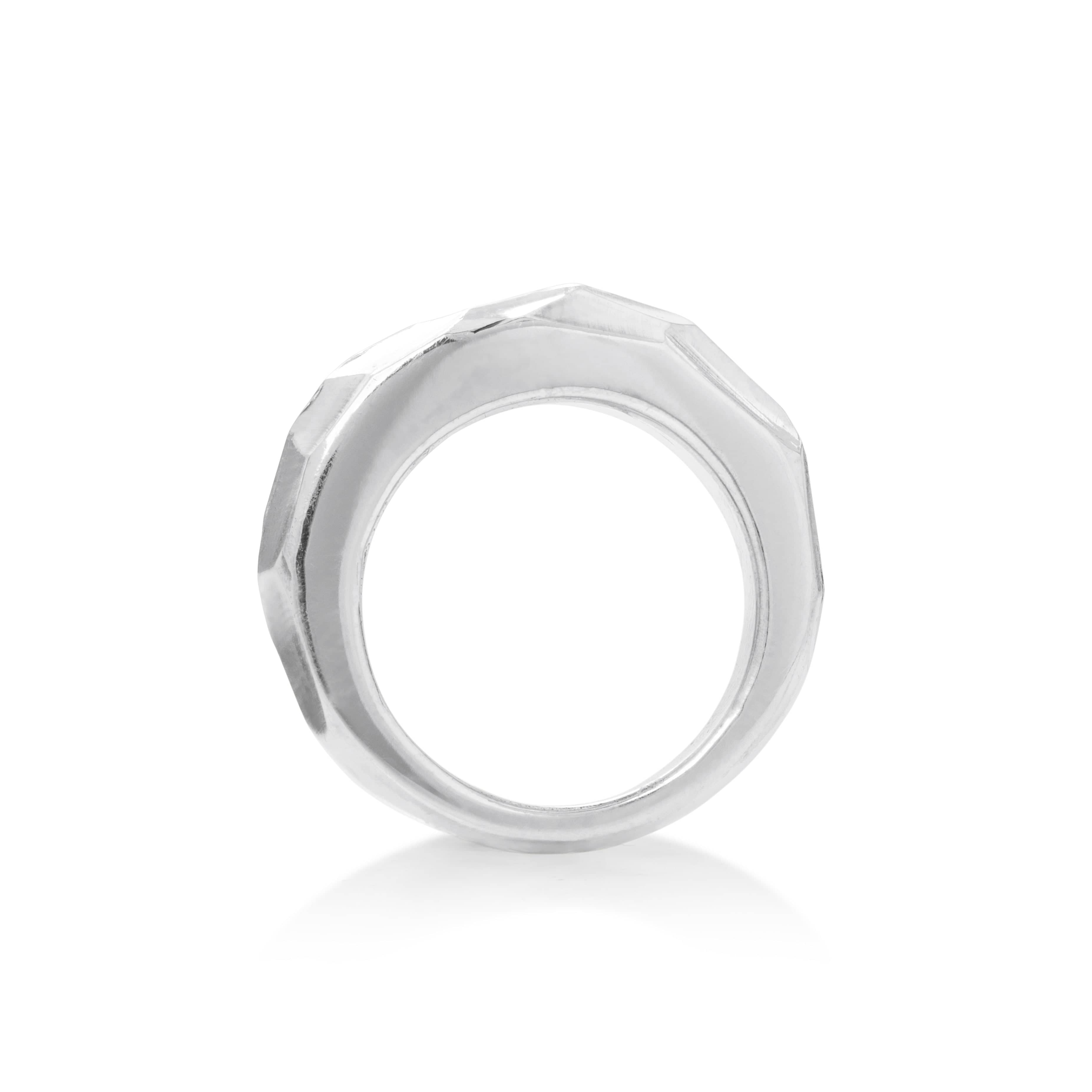 Solid Sterling Silver band, chiseled edges decorate the dome shaped ring side view