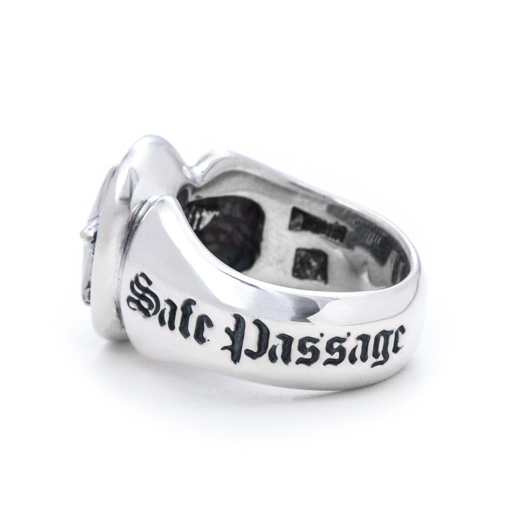 Solid Sterling Silver thick band, one star on the side of the ring and a larger star on the head of the ring. The words 